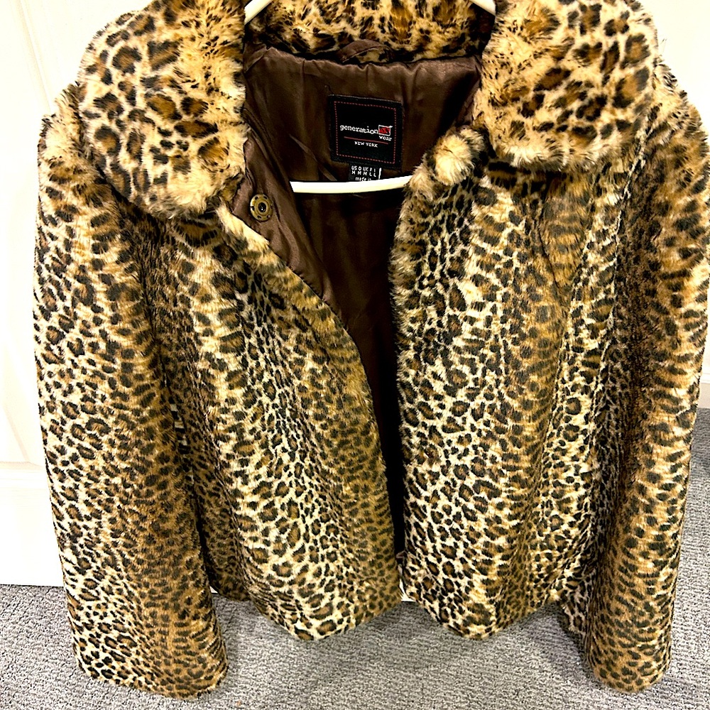 Faux Leopard jacket, cozy and warm. Excellent condition